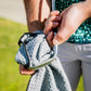 White magnetic towel featuring a sleek design, ideal for easy attachment and use.
