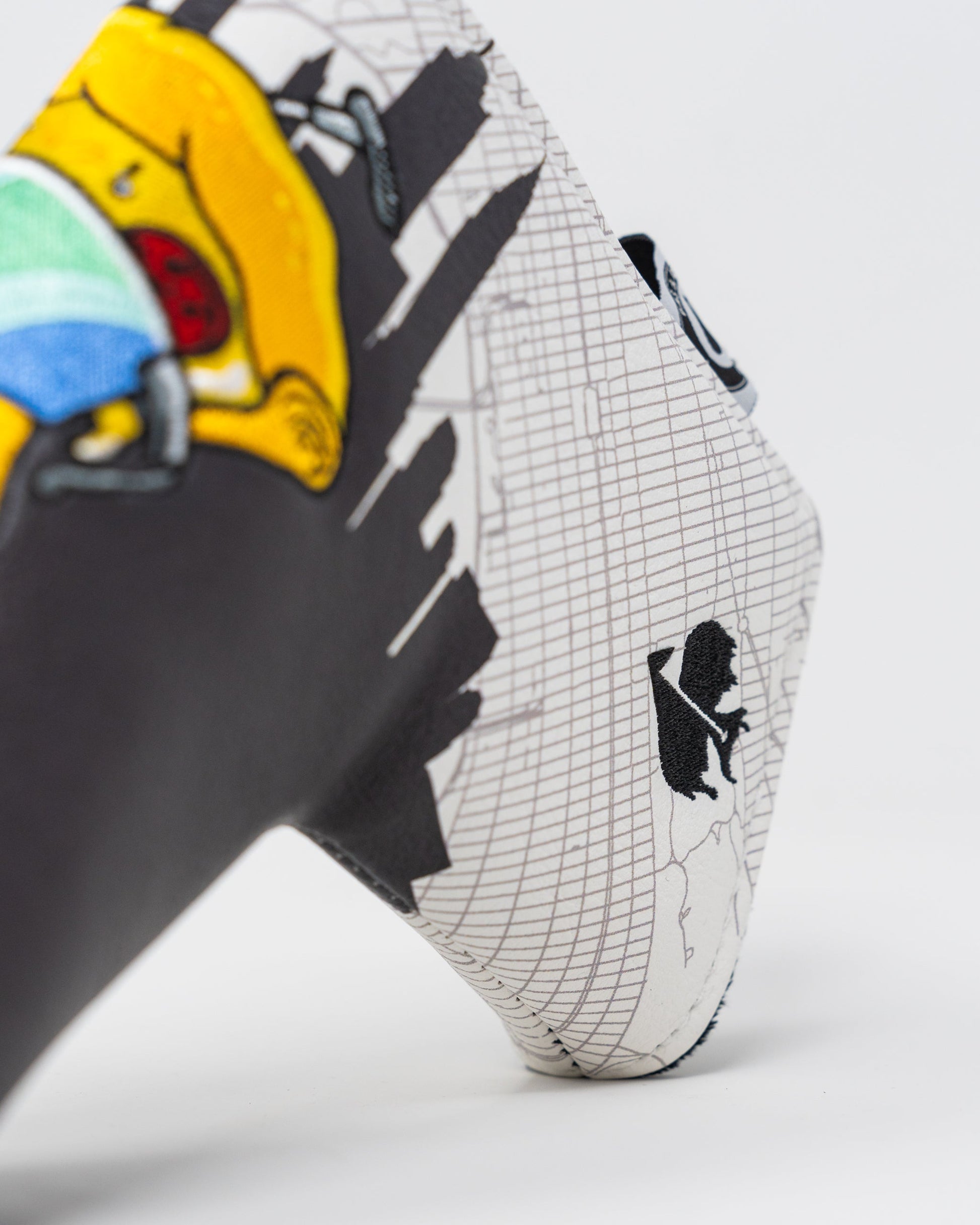 Shady Slice Blade Putter Cover featuring a vibrant graphic design and durable material, ideal for protecting golf putters.