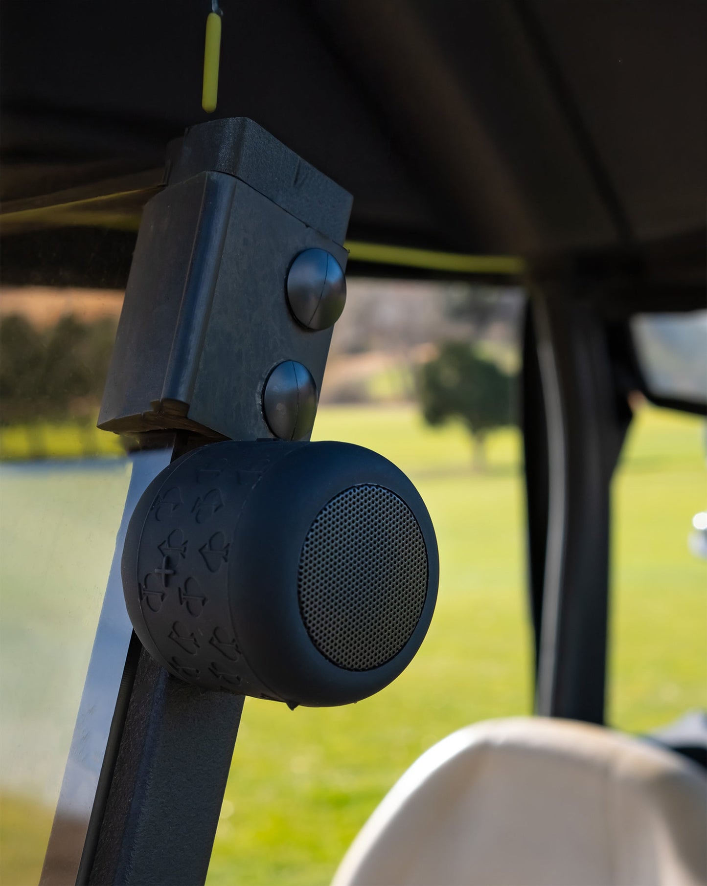 Stylish Spade Speaker in modern interior setting, showcasing sleek design and unique shape.