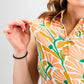 Women's Garden Party Spritz dress, featuring a colorful floral print on a light background, perfect for spring occasions.