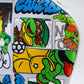 TMNT Comics Driver Cover showcasing colorful Teenage Mutant Ninja Turtles artwork, featuring iconic characters and vibrant comic-style graphics.