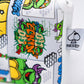 TMNT Comics mallet cover featuring colorful artwork of Teenage Mutant Ninja Turtles in action.