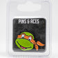 TMNT Michelangelo ball marker featuring a vibrant orange and green design with the character's face.