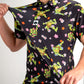 TMNT Turtle Flower Power graphic polo featuring vibrant colors and iconic Teenage Mutant Ninja Turtles design.