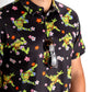 TMNT Turtle Flower Power graphic tee featuring vibrant colors and iconic Teenage Mutant Ninja Turtles characters surrounded by floral designs.
