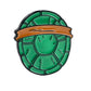 TMNT Shell Shock Ball Marker featuring vibrant Teenage Mutant Ninja Turtles graphics, ideal for golf enthusiasts.