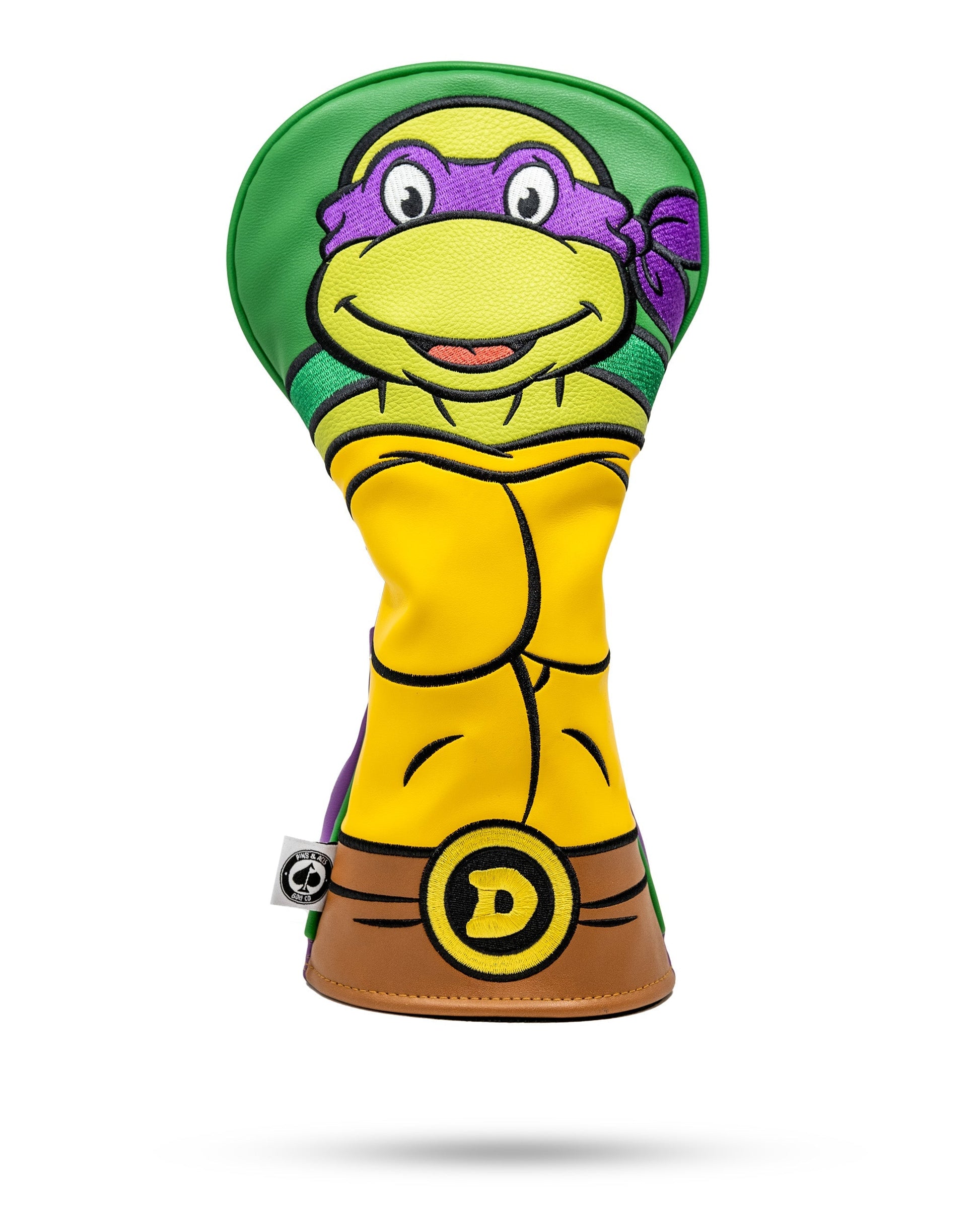 TMNT Donatello driver cover featuring vibrant purple and green colors, showcasing the character's face with a signature mask and expression.
