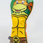 TMNT Michelangelo headcover featuring vibrant orange colors and character design, ideal for golf clubs.