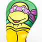 Alt text: "TMNT Donatello driver cover featuring a vibrant design of the character in purple with detailed facial features and a ninja mask."