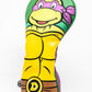 TMNT Donatello driver cover featuring a vibrant green design with Donatello's face and signature purple bandana.