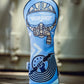 Top Gun Ice Man themed golf club headcover featuring a pilot helmet, goggles, and a clenched fist holding a lightning bolt.