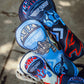 Three Top Gun Maverick-themed golf driver headcovers featuring aviation and fighter pilot designs in black, white, and blue colors.