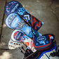Top Gun Ice Man themed golf headcover set with military-inspired design and bold colors, placed in a golf bag with clubs.