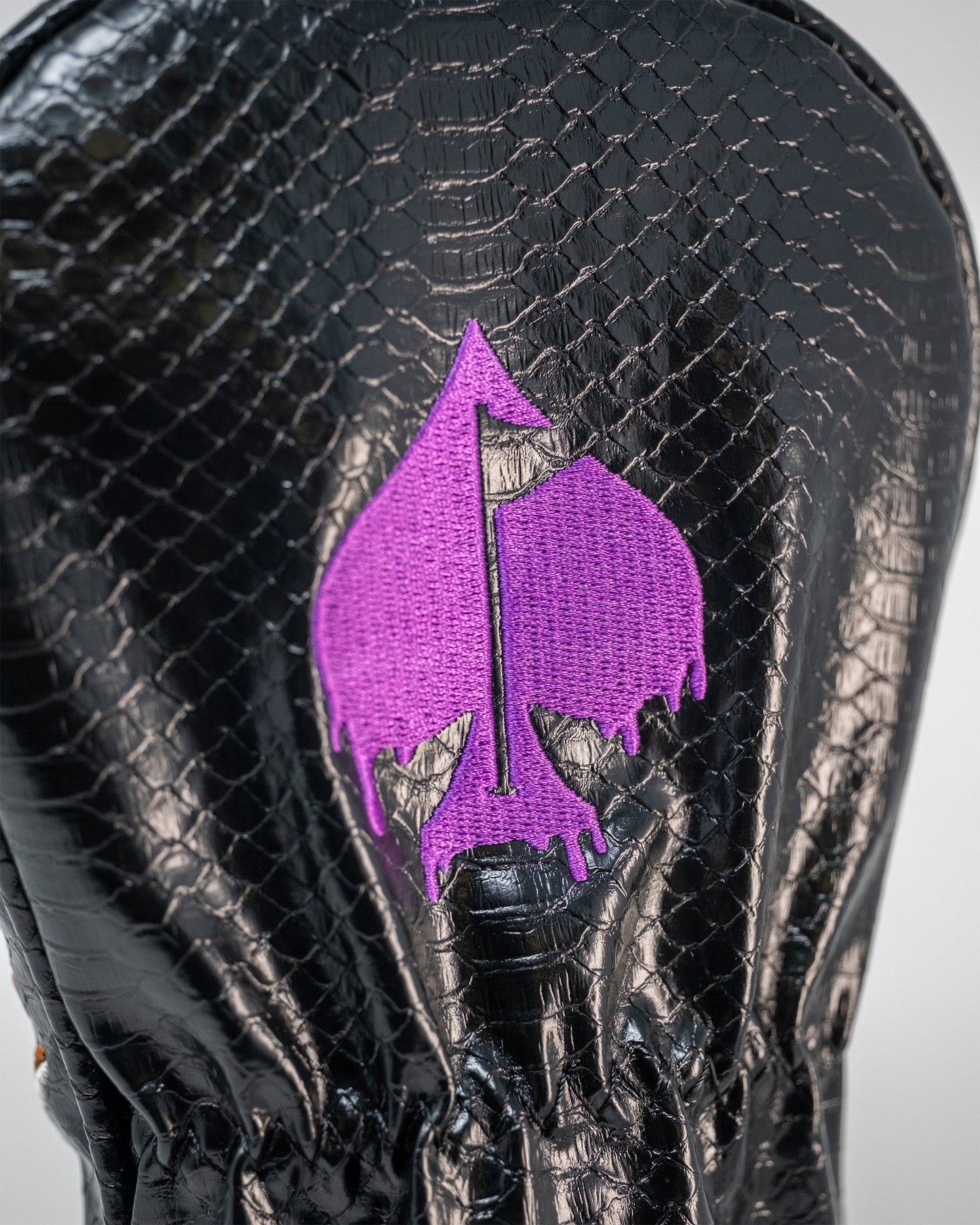 Venom Fairway Cover featuring a sleek design with a reptilian texture and vibrant color scheme, ideal for golf clubs.