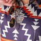 "Yellowstone Rustic Ranch apparel featuring a distressed graphic design with mountains and trees on a dark background."