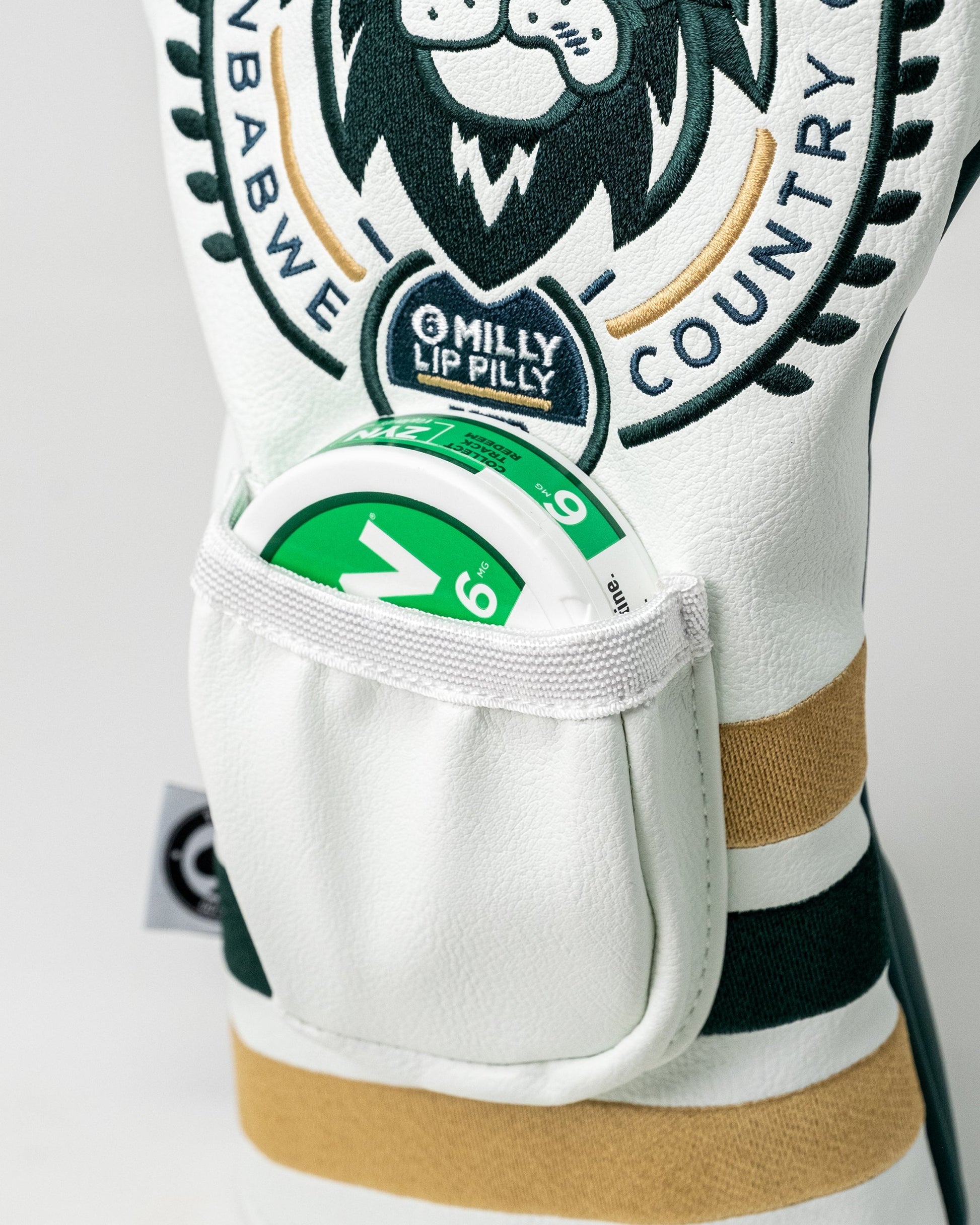 Zynbabwe Country Club golf driver cover featuring a sleek design with vibrant colors and the club logo.