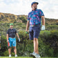 Cabo Colada polo shirt featuring a colorful tropical print on a light background.